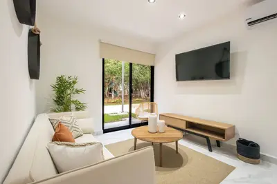 Image de 3-bedroom apartment in brilliant Playa del Carmen with WiFi, Ac, 3 Pools.