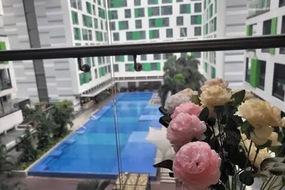 Image de Republic Plaza Poolview - Chic Stay Near Airport