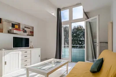 Image de Studio confortable face mer - 4 couchages avec parking