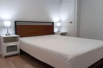 Image de Basement suite with private bathroom and living room in Calgary-New