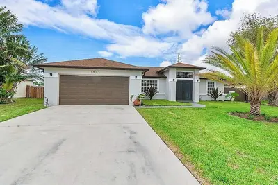 Image de 3-bedroom house in wonderful Port St. Lucie with Ac, WiFi