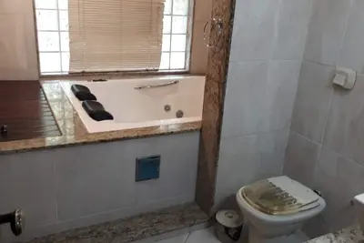 Image de Cozy Riverside House in Guapimirim in Condominium