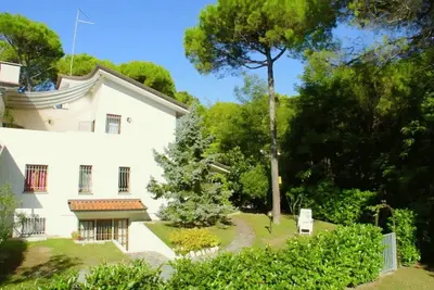 Image de Appartement de 3 pièces avec Wi-Fi et patio privé dans un quartier verdoyant de Lignano Sabbiadoro