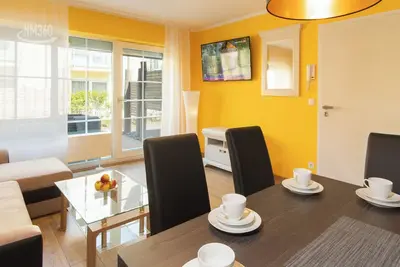 Image de ODINs view We 12, with terrace, directly on the private beach, sauna, garden