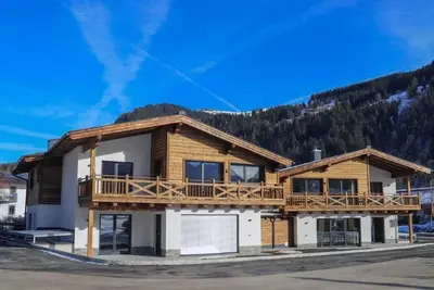 Image de Appartement neuf avec chauffe-bottes de ski
