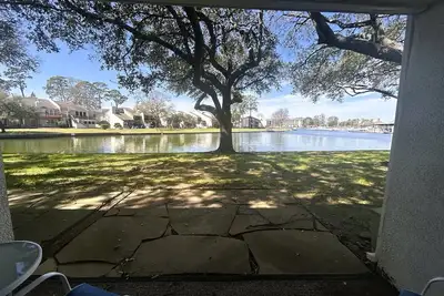 Image de Waterfront Condo with the Lake Steps from Your Patio!
