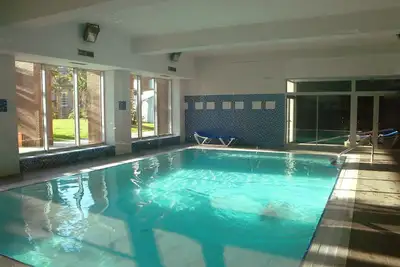 Image de Joli appartement pour 7 personnes avec Wifi, bain à remous, climatisation, piscine, Tv et terrasse