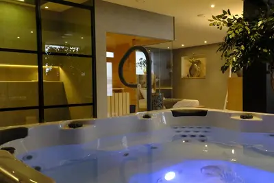 Image de Relax in Wellness Room with Sauna and Spa Bath and luxurious outdoor seating.