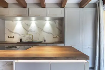 90 sqm apartment with floor-to-ceiling bay windows, a fully equipped kitchen
