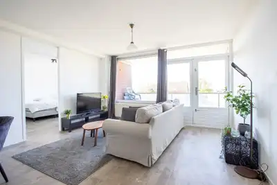 Image de Cozy and clean 2-room apartment in Burgerbrug - close to the beach and nature!