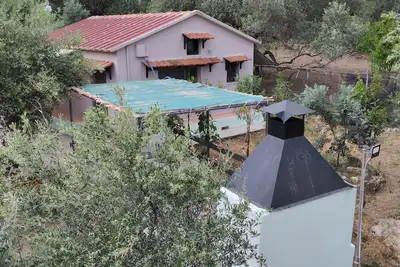 Image de olea cottage, a peaceful retreat in an olive grove in Galatas.