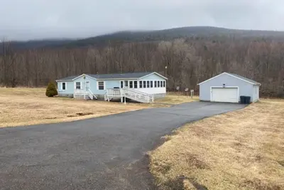 Image de Charming 3-bedroom mobile home with Ac, WiFi in peaceful Prattsville