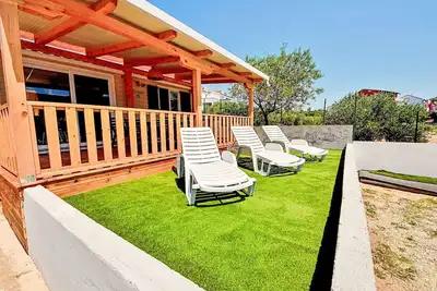 Image de Magnifique maison de vacances privée pour 4 personnes avec climatisation, Wifi, Tv et terrasse