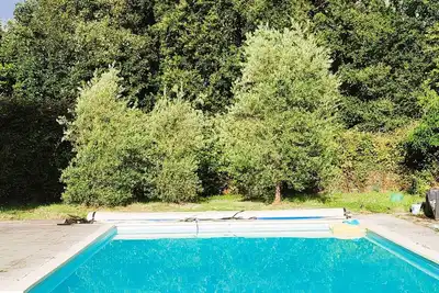 Image de Camping 5 min de Carhaix. Vieilles Charrues. ptt dej navette et piscine inclus
