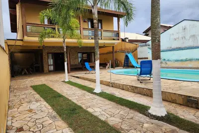 Image de Cozy house, in a gated community facing the beach, 4 suites, Wi-Fi, swimming pool