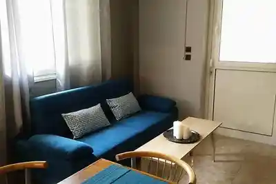 Image de Το Calma apartment έχει θέα στον κήπο και διαθέτει βεράντα και μπαλκόνι.