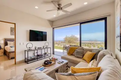 Coastal-luxe apartment with ocean-view patio, resort pool & hot tub