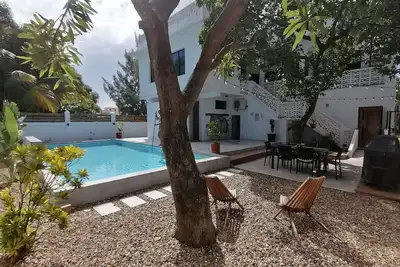 Image de Downtown Dangriga! Style and comfort with a pool. Maya Mountains and sea views.