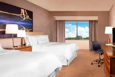 Image de 3 Chic Rooms with Onsite Pool & Gym Access. Close to Dallas Park Central