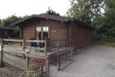 Image de Hand built log cabin at Avonvale Holiday Lodges