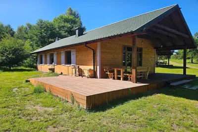 Image de Maison au bord du lac Wierzchowo avec bateaux