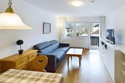 Image de Appartement 'Mit Bergblick, Pool, Sauna' avec vue sur les montagnes, jardin partagé et Wi-Fi