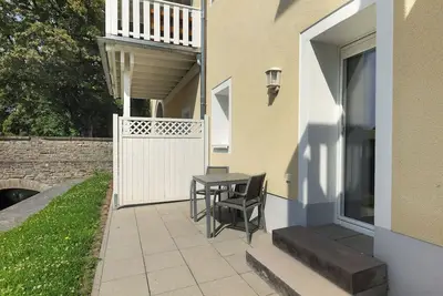 Image de Appartement '2 - Goldfever' avec terrasse privée, jardin partagé et Wi-Fi