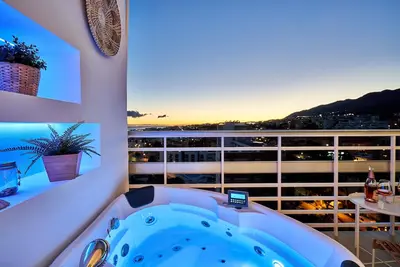 Image de Sunset Beach - Charming apartment with jacuzzi.