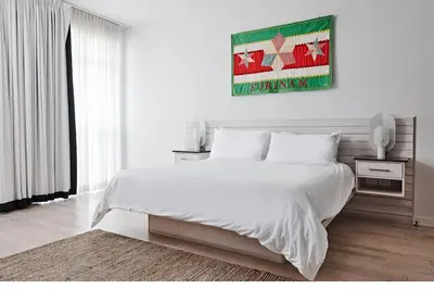 Image de Breathtaking Beach Close from Your Door Steps | Suite w\/ Living area