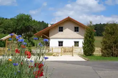 Image de Maison de vacances 'Geyerbad' avec vue sur les montagnes, terrasse privée et Wi-Fi