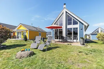 Image de Maison de vacances 'Annes Bootshaus' avec vue sur le lac, terrasse privée et Wi-Fi