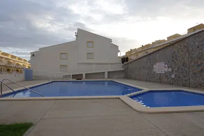 Image de Two Bed, ground floor apartment, AIr-Con, wifi, communal pool.