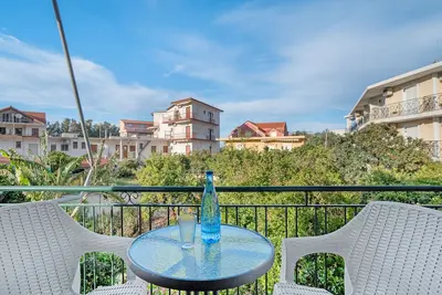 Image de Appartement '' avec jardin partagé, Wi-Fi et climatisation