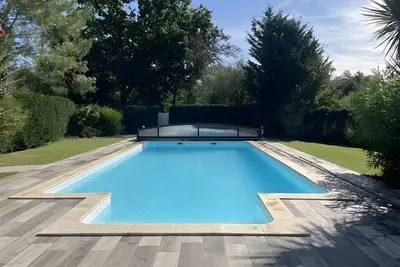 Image de Maison Champaubier – Piscine Chauffée, Parc Privé, Idéale pour 10 pers. à Montpon-Ménestérol