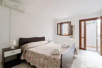Image de Maison de vacances 'Mery Villaggio Chiusurelle 2' avec piscine partagée, terrasse et climatisation