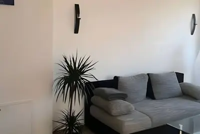 Image de Appartement 'Abendrot, 45qm' avec vue sur le lac, balcon et Wi-Fi