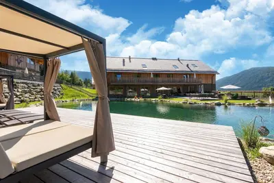 Image de Chalet à Wölting avec étang de baignade naturel