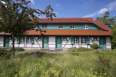 Image de Vacation apartment close to the beach with private terrace - Feriendorf Bakenberg FeWo C27