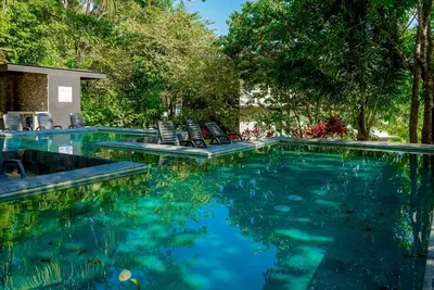Modern condo with on-site pool, WiFi, and centrally located