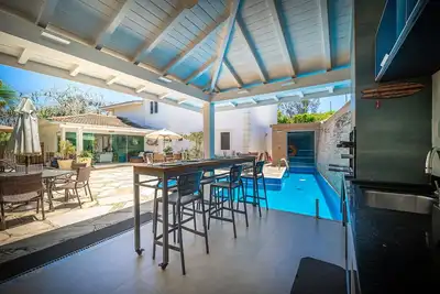 Image de Bz79 House with Pool and Sauna 180 m from the Beach!