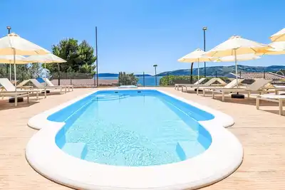 Image de Bel appartement pour 5 personnes avec Wifi, climatisation, piscine, Tv, terrasse et animaux admis