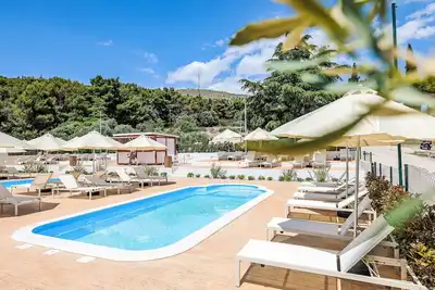 Image de Joli appartement avec Wifi, climatisation, piscine, Tv, terrasse et animaux admis