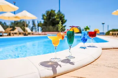 Image de Bel appartement pour 5 personnes avec Wifi, climatisation, piscine, Tv, terrasse et animaux admis