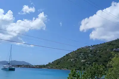 Image de 2-bedroom apartment in Cane Garden Bay with Ac, WiFi, right on the beach front
