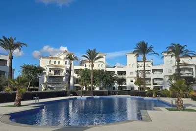 Image de Coziness trumps all at Casa Gusto at Spain's Hacienda Requilme Golf resort.