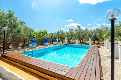 Image de Trullo 'Antico Pasquale Con Piscina' avec piscine privée, terrasse privée et Wi-Fi