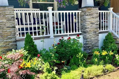 Image de Charming 4-bedroom house sleeps 15 in the wonderful beach town of Ludington!