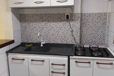 Image de Quartos com área comum para hóspedes no Centro de Curitiba com WiFi