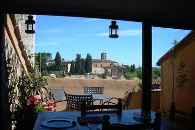 Image de Detached attic room with private bathroom in ancient village in Colle Alta