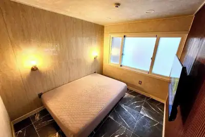 Image de 단체 및 가족 여행에 적합한 넓은 공간과 세련됨을 모두 갖춘 숙소입니다.